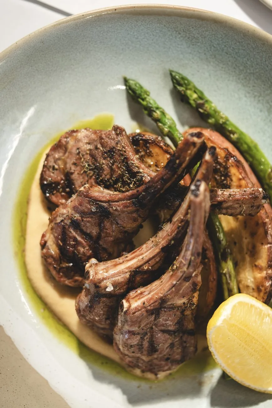 Charcoal-grilled lamb cutlets, a Greek favourite at Opa Echuca