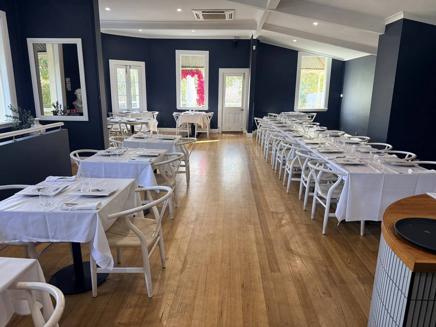 The Upstairs Events Space at Opa Echuca set with long tables