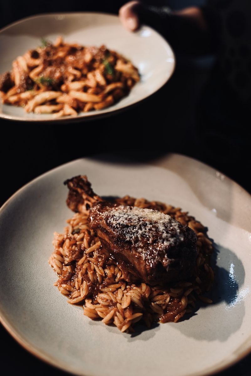 Lamb on orzo with grated cheese at OPA Echuca