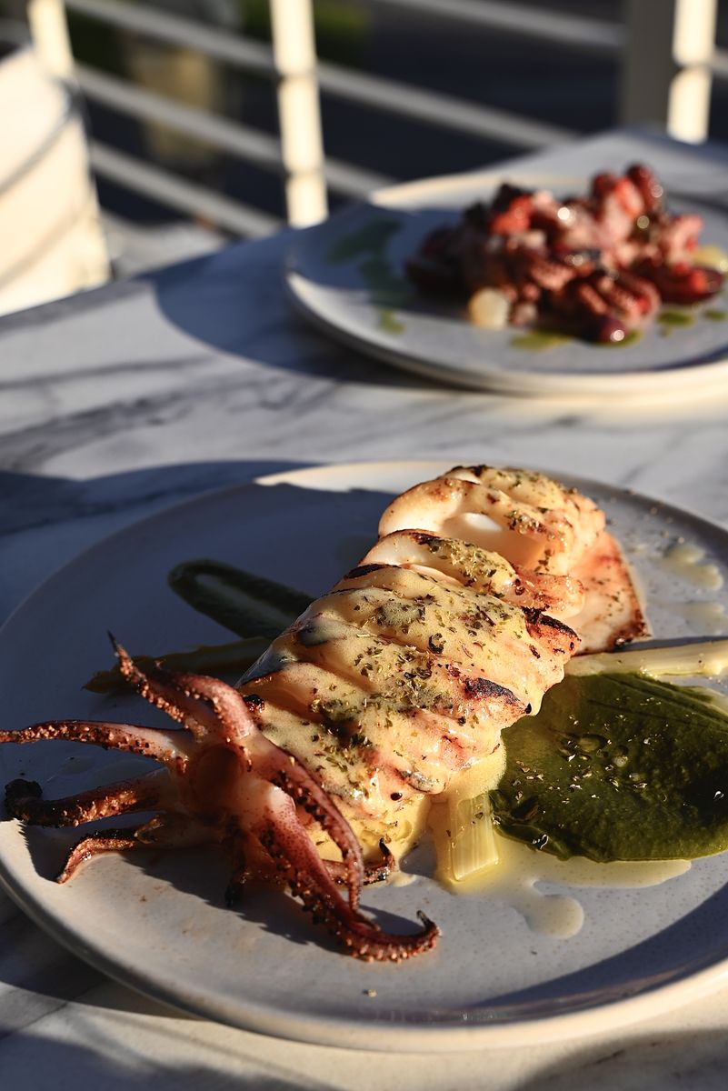 Chargrilled calamari on the balcony at golden hour at OPA Echuca